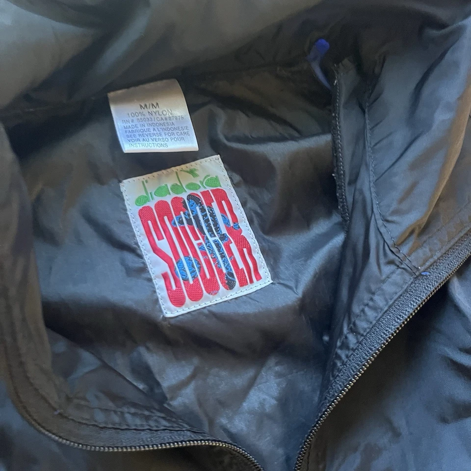 Chaqueta cortavientos vintage Diadora Spellout cremallera completa multicolor ligera mediana Foto 2 de 4