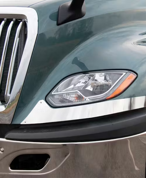INTERNATIONAL LT SS headlight surround trim PAIR SET