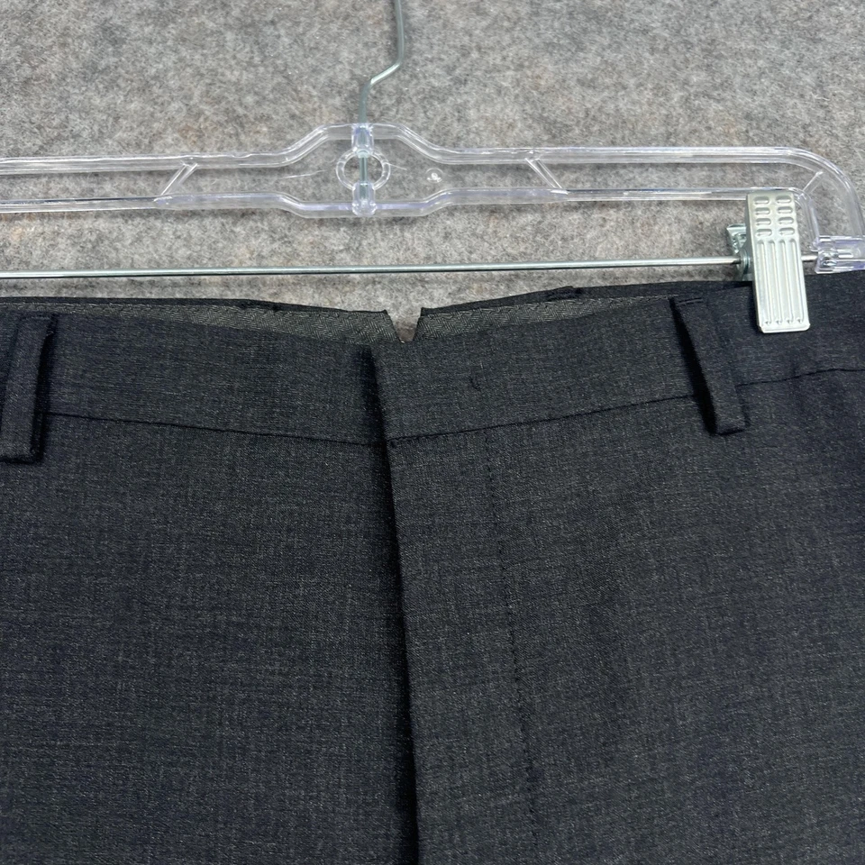 Pantalones de vestir DKNY para hombre 40x32 negros mezcla de lana frente plano clásicos ajustados Foto 3 de 4