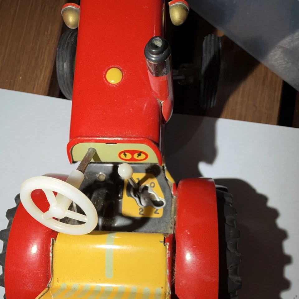 Blechspielzeug Traktor rot/gelb mit Anhängekupplung, Kette, Lenkrad JL - Bild 4 von 4