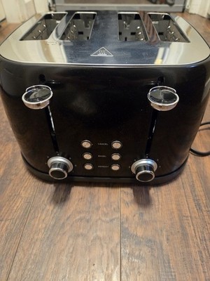 Amazon Basics 4 Slice Toaster with 4 Slots, 6 Browning Settings, Defrost, Remova