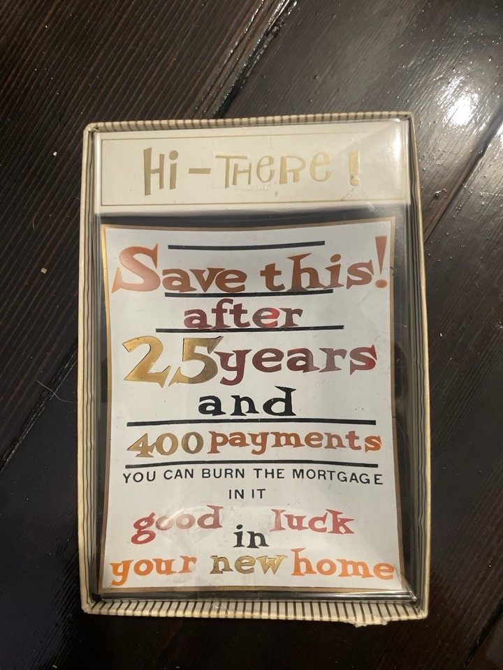 Deadstock novelty ashtray from an era when burning your mortgage was a genuine celebration ritual — a time-capsule gag with real cultural texture.