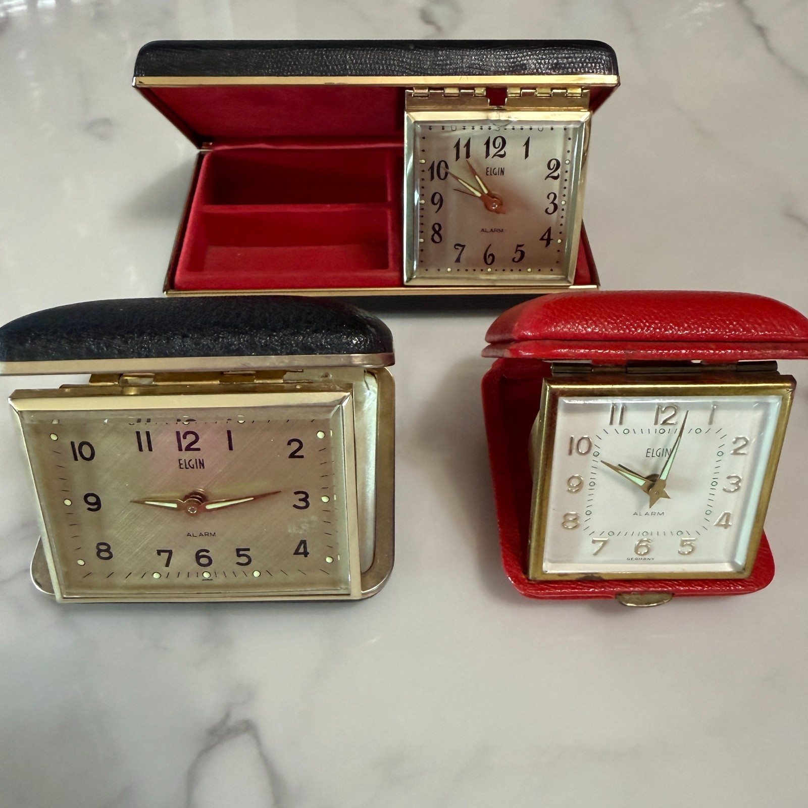 3 Vintage Elgin Folding Travel Alarm Clocks Red Black Germany Vanity Case photo 3 Vintage Elgin Folding Travel Alarm Clocks Red Black Germany Vanity Case featured image