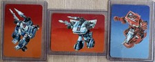 Three 1985 Transformers Cards: Mirage, Jazz, Ironhide. Excellent Condition
