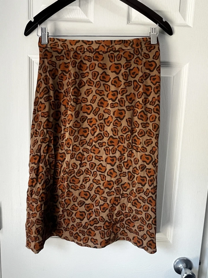 Falda Tucker Estampado Leopardo Mezcla Seda con Bolsillos Cintura Alta Talla Pequeña Sin Forro Foto 4 de 4