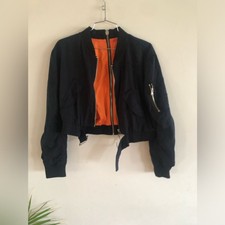 Black Crop Bomber Jacket. With Back Zip Design And Orange Interior