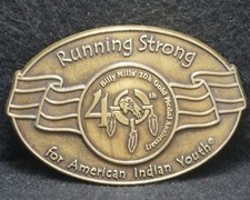XC19108 VINTAGE 1970s  RUNNING STRONG FOR AMERICAN INDIAN YOUTH  BELT BUCKLE