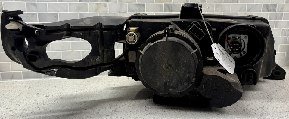 Faro izquierdo (halógeno) Saab 9-5 2002-2005 OEM 5142096 Foto 3 de 4