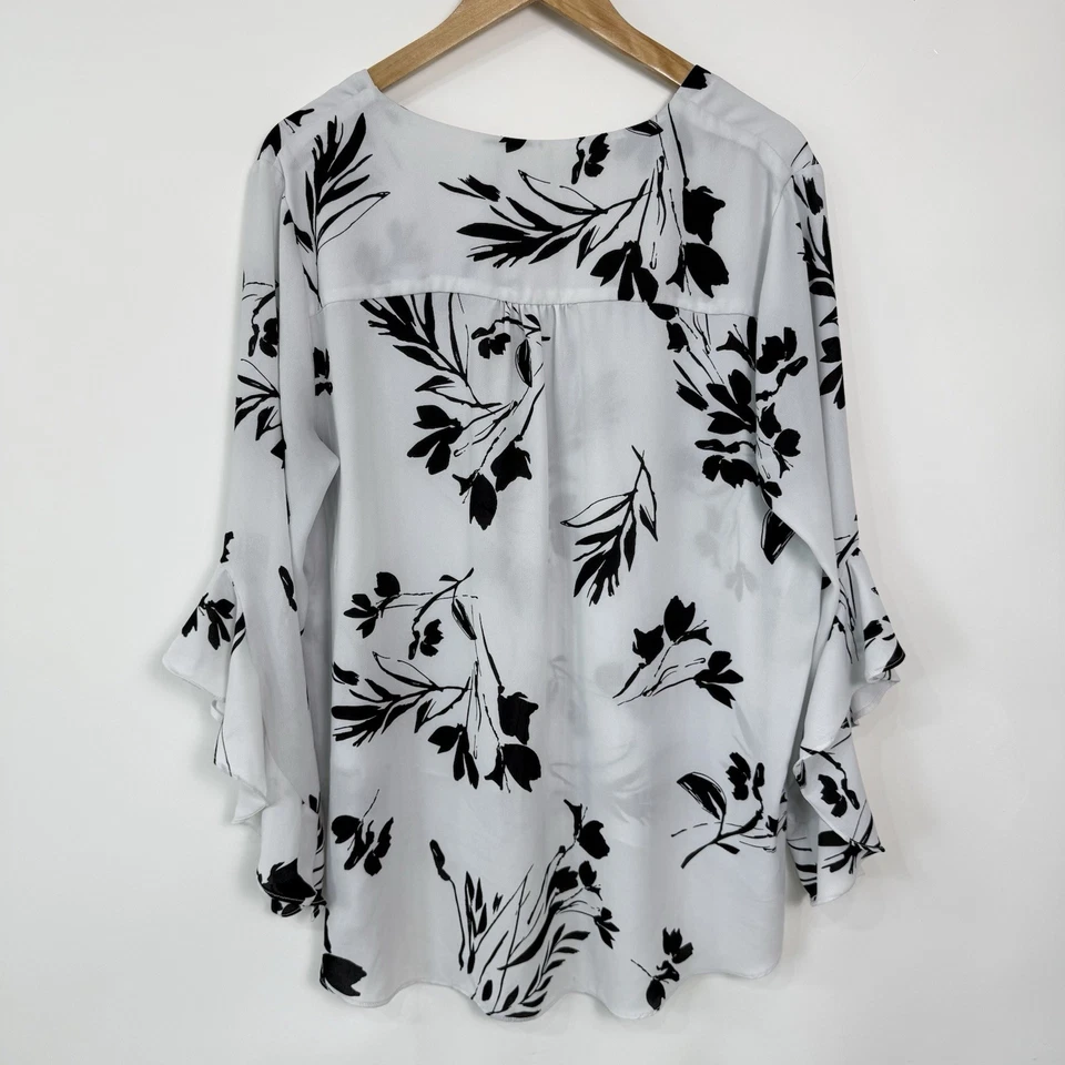 Blusa túnica Grace talla XL blanco roto con estampado floral negro mangas largas campana Foto 4 de 4