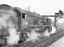PHOTO  SR WEST COUNTRY  LOCO NO 34104 AT BASINGSTOKE