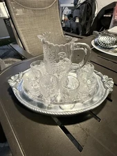 EAPG Child Nursery Rhyme pitcher and 6 Glasses Set C1900s