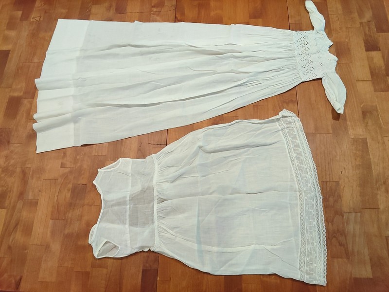 two vintage baby dresses in fair condition
