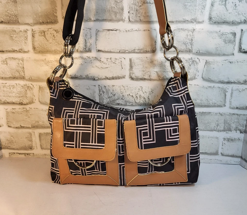 Bolso Bandolera LeSportsac Blanco y Negro Forro Amarillo Geométrico 13" Foto 2 de 4