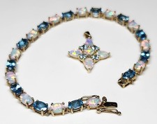 10k Yellow Gold Opal And Blue Topaz Tennis Br...