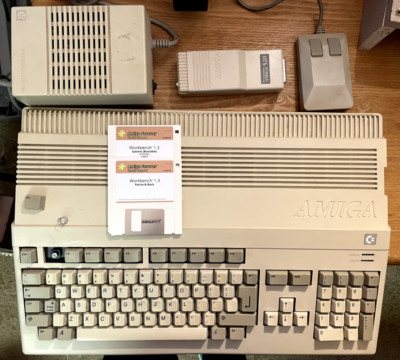 Amiga 500 with power supply, tank mouse, Workbench 1.3 and A520