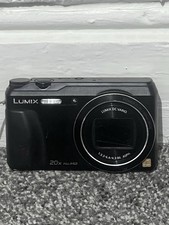 Panasonic Lumix DMC-TZ55 20x Zoom Digital Camera + 2 Batteries & LCD USB Charger