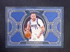 2024-25 Panini National Treasures Luka Doncic #7 Treasured Metals /25