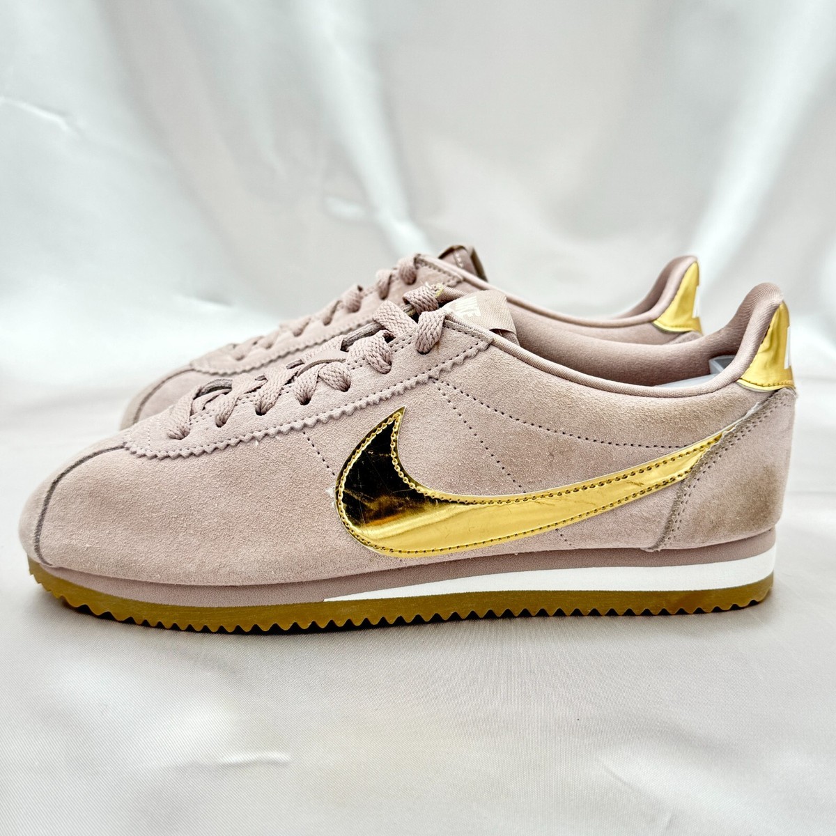 all gold nike cortez