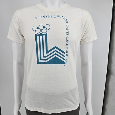 トップス 80s  olympic winter games tee Vintage 1980s XII Olympic Winter Games Lake Placid 1980 White T