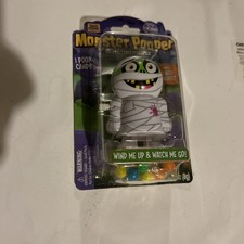 Monster Pooper Mummy Walking Candy Dispenser Wind-Up Toy Halloween Treat Street