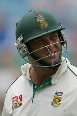 Jacques Kallis of South Africa winces as he watches a replay of h- 2004 Photo