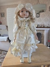 Porcelain  Doll with Cream Dress no name or brand