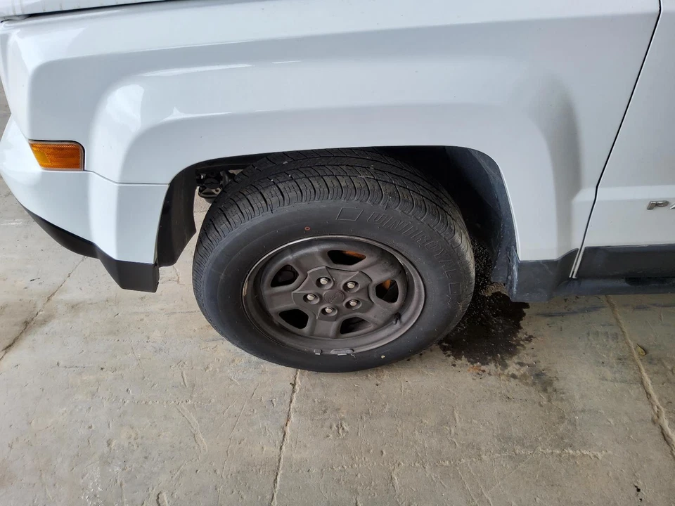 Used Left Door Mirror fits: 2012 Jeep Patriot moulded in black manual Left Grade - Image 4 of 4