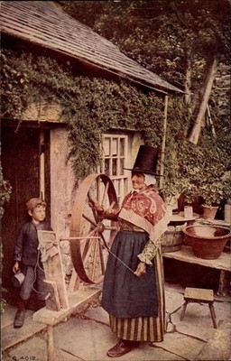 Welsh woman child Wales traditional costume hat spinning wheel vintage postcard
