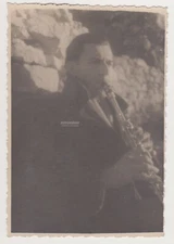 Affectionate Handsome Young Man Pours His Soul into the Clarinet Cute Male Gay