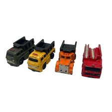 Lote de cuatro camiones de metal micro mini juguete de colección China - tres camiones de volteo/camión de bomberos