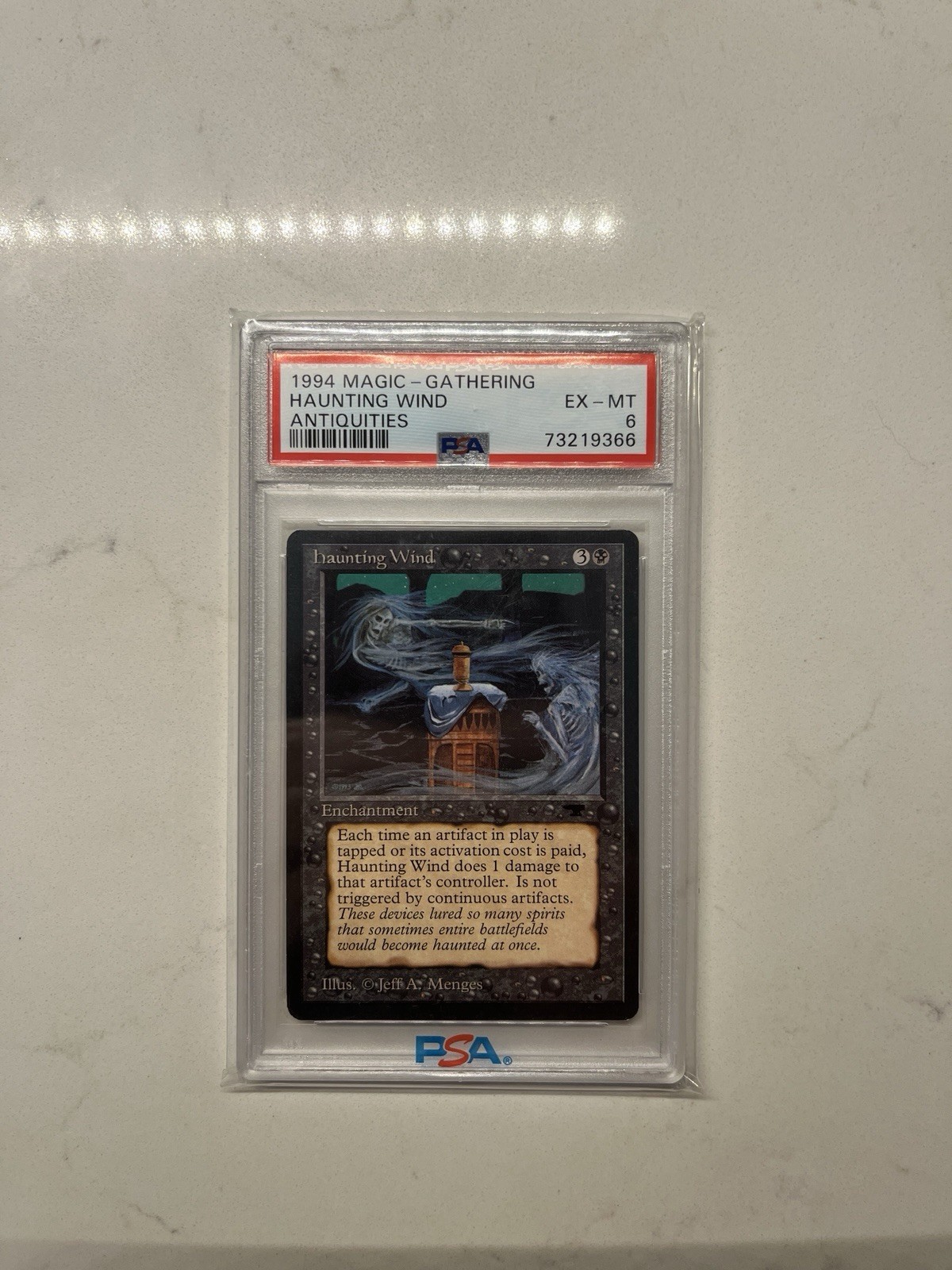 Magic The Gathering 1994 Antiquities Haunting Wind PSA EX - MT 6 Reserved List