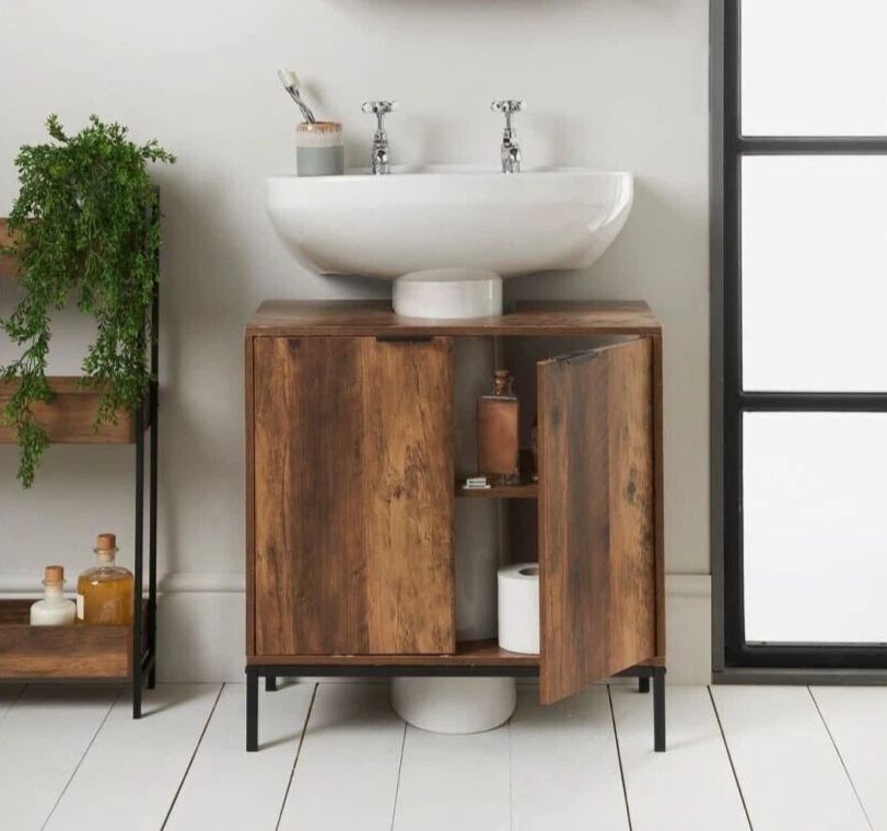 Bathroom storage cabinet under sink outlet