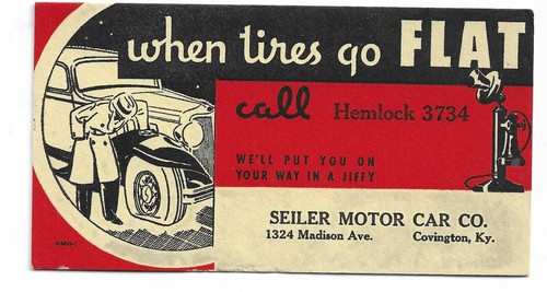 1934 covington KY blotter @ Seiler Motor Car Co. man staring@ flat tire KENTUCKY