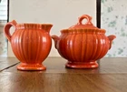 Vintage Stangl Orange 1388 pattern lidded sugar bowl and creamer
