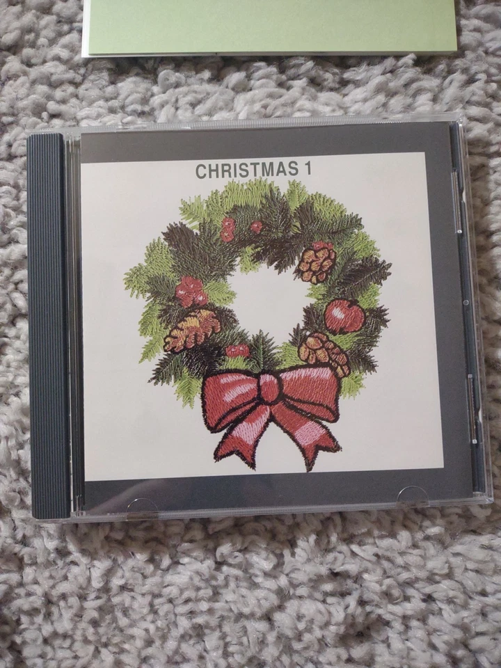 Tarjetas de memoria Janome impresiones Navidad 1 diseño bordado con folleto Foto 2 de 4