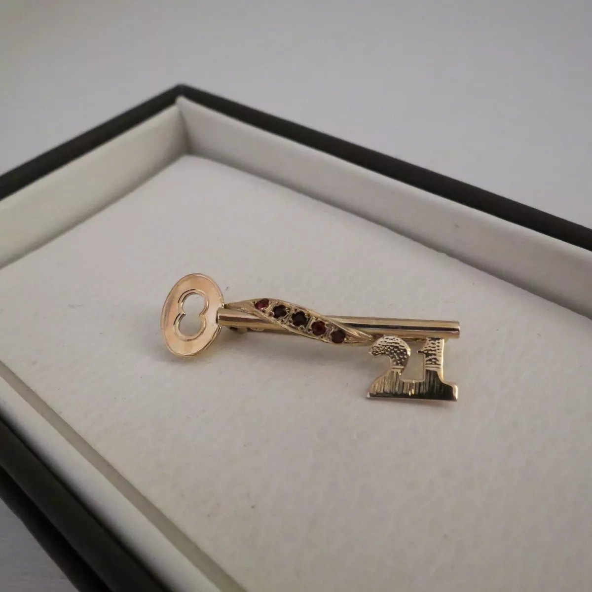 Key brooch cheap