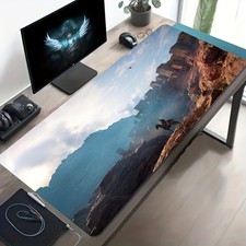 A Large Gaming Mouse Pad Featuring a Warrior ...