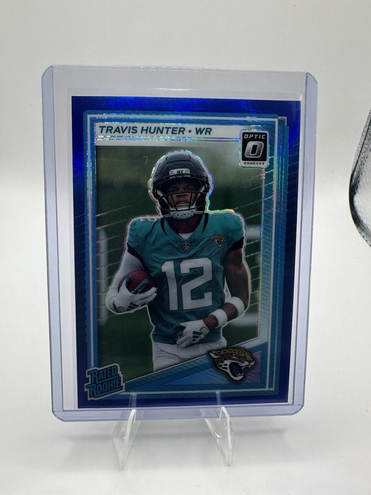 2025 Panini Donruss Optic Travis Hunter #201 Jaguars Rated Rookie Blue Hyper