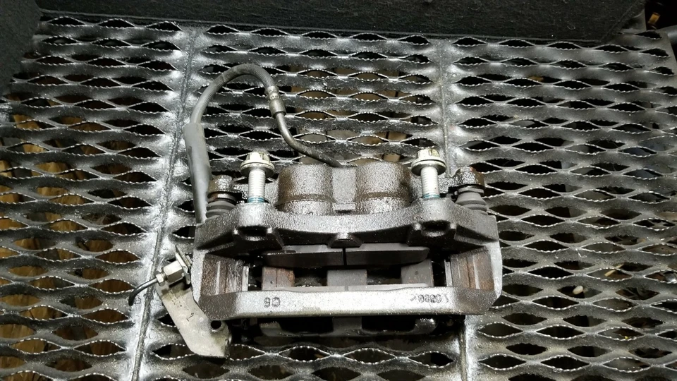 10 11 12 Lincoln MKT 3,5 L PINZA FRENO CONDUCTOR DELANTERO IZQUIERDO OEM Foto 2 de 4