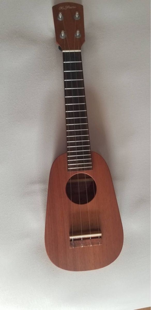 Final price reduction ~ Ukulele string-wound head part wood grain