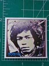 Tarjeta adhesiva de música rock pop 1981 revista Adamo Jimi Hendrix
