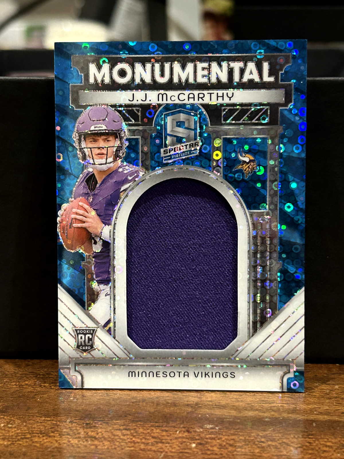 JJ McCarthy Panini Spectra Monumental Memorabilia #MMJJM Neon Blue