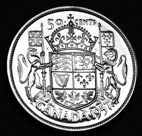 1957 50¢ silver in a paper flip UNC and MS - gorgeous coin in every way