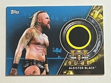 2018 TOPPS WWE TAKE OVER ALEISTER BLACK MAT RELIC #TBR-AB AND SERIAL #14/50