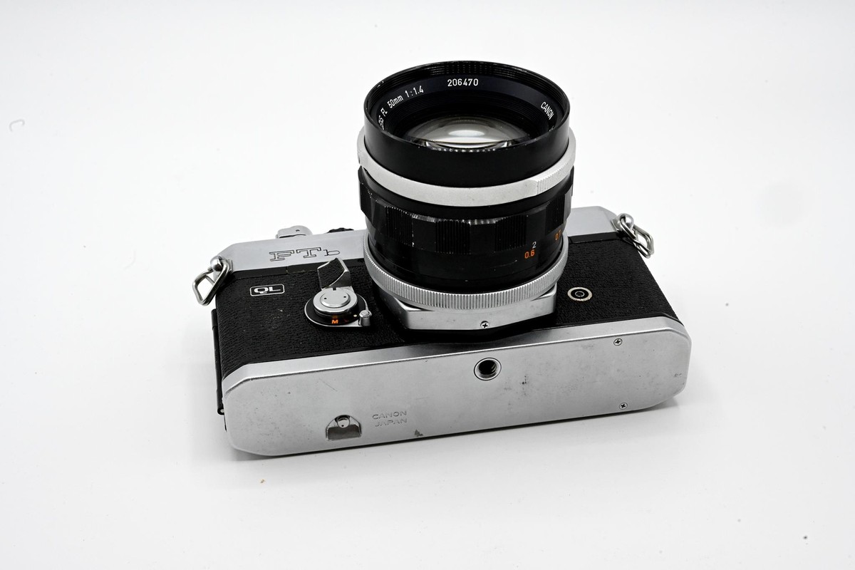 Chrome Canon FTb-QL 35mm SLR Camera with 50mm f/1.4 FL Lens