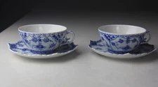 Pair of Royal Copenhagen Blue Fluted Full Lace Flat Cups and Saucers #1130