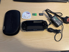Sony PSP-1000 Black with ORIGINAL UK Plug Adaptor AND Ridge Racer UMD
