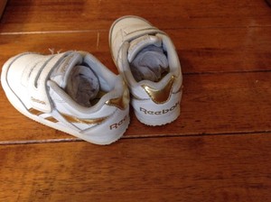 sneakers with gold trim