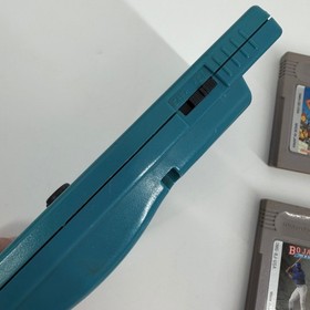 Nintendo Game Boy Color Teal Console Bundle with 13 Games and Cases