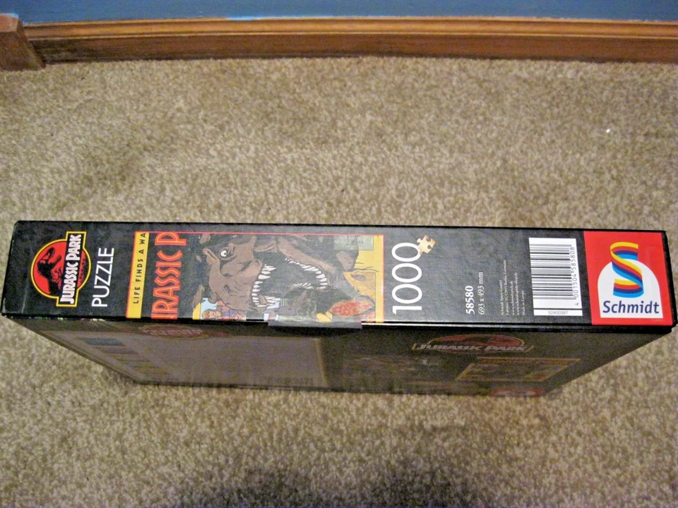 PUZZLE SCHMIDT 1000 PIEZAS 30 AÑOS DE PARQUE JURÁSICO: ¡LA VIDA ENCUENTRA UNA MANERA DE ECHAR UN VISTAZO! Foto 3 de 4